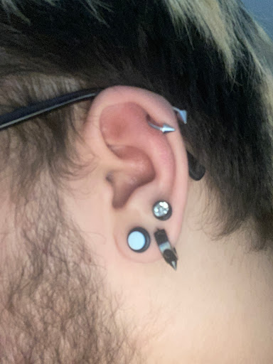 Explore daddy and son tattoo ideas, creative tattoo ideas in Muncie, available at Abandon all hope tattoo and body piercing