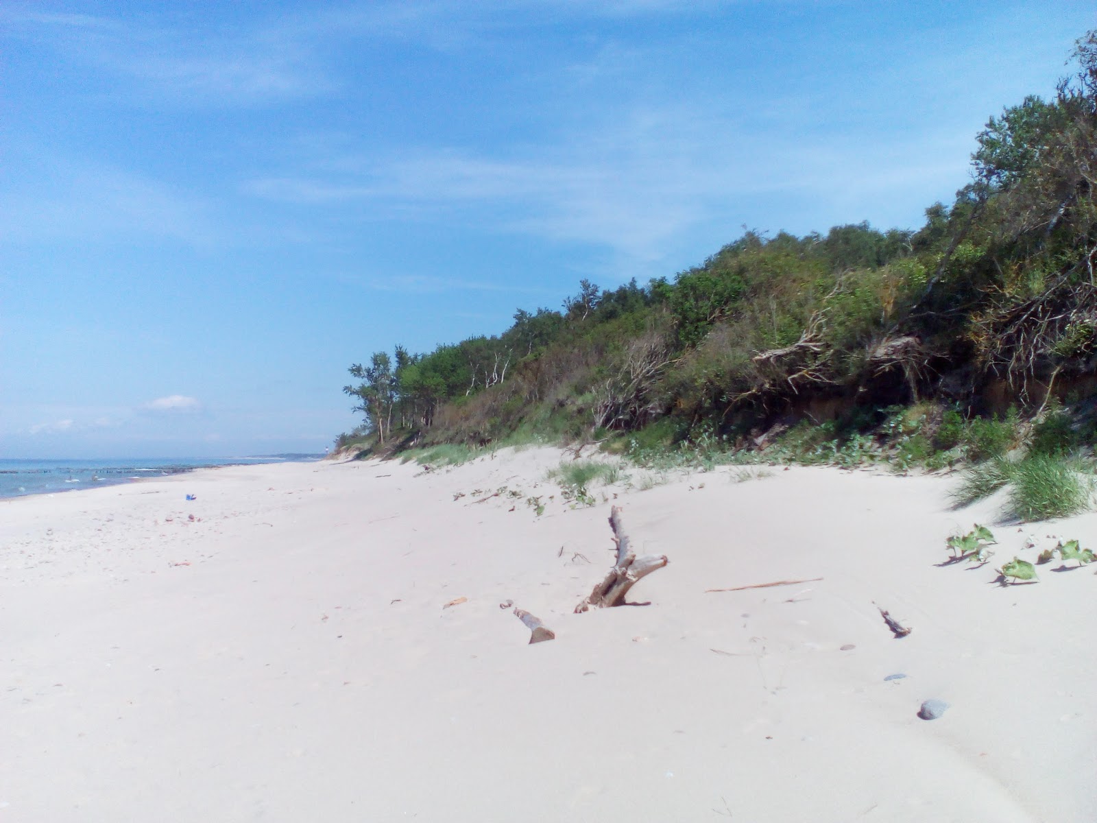 Foto van Lestniza k moryu met helder zand oppervlakte