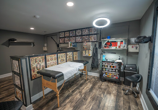 Explore tattoo cover up ideas for upper back, creative tattoo ideas in Charleston, available at The Edge Tattoo Studio