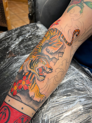 Explore dog paw tattoo ideas, creative tattoo ideas in Rapid City, available at Convicted Designs Tattoo & Piercing