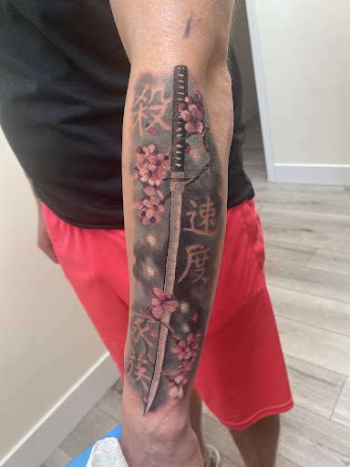 Explore side neck tattoo ideas, creative tattoo ideas in Grand Haven, available at Ink Haven Tattoo Studio