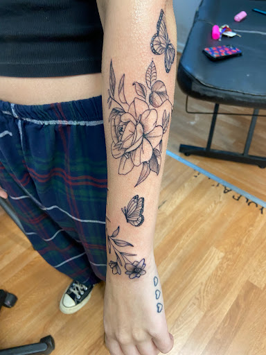 Explore flower tattoo ideas for guys, creative tattoo ideas in Charlotte, available at BNI-Tattoos