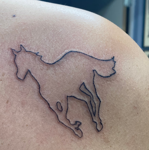 Explore singer tattoo ideas, creative tattoo ideas in Georgetown, available at One Love Tattoos