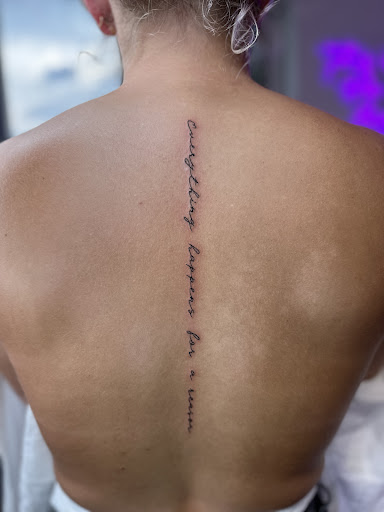 Explore front thigh tattoo ideas for women, creative tattoo ideas in Angola, available at Dazzled Ink Fine Line Tattoos