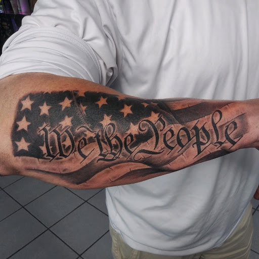 Explore book lovers tattoo ideas, creative tattoo ideas in Brandon, available at Pinup Tattoo Studio