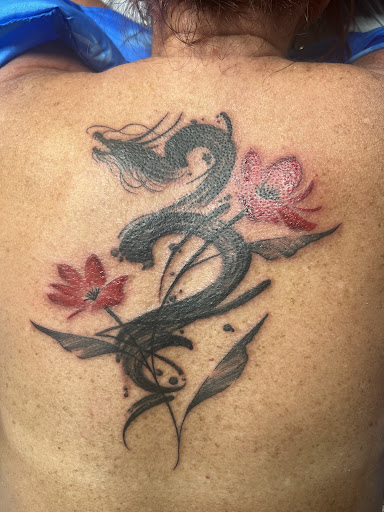 Explore university of michigan tattoo ideas, creative tattoo ideas in Kissimmee, available at Fallen Heroes Tattoo & Piercing (Florida)