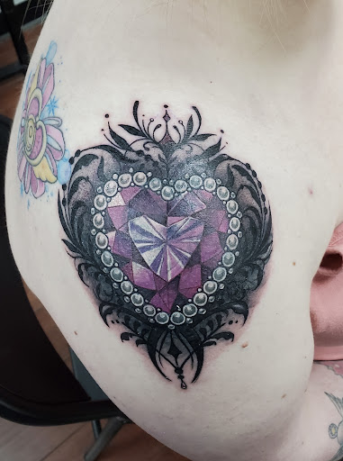 Find black mamba kobe bryant tattoo ideas for your next unique tattoo in Toledo at 4 Nineteen Ink