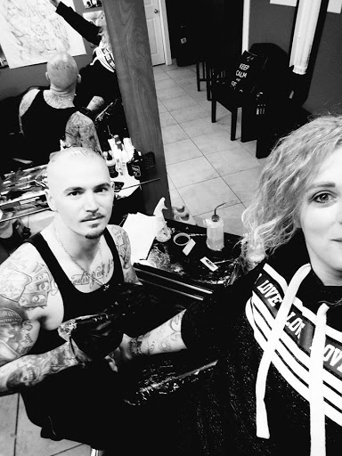 Explore hand tattoo ideas man, creative tattoo ideas in Salem, available at Alchemy Tattoo Collective