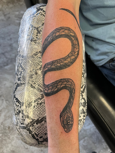 Explore couple his and her tattoo ideas, creative tattoo ideas in Seymour, available at American Gypsy Tattoo Corp.