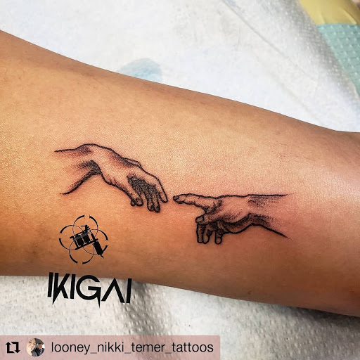 Explore shark tooth tattoo ideas, creative tattoo ideas in Santa Fe, available at Rivers Collective Body Art