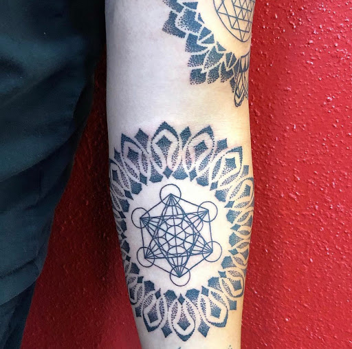 Explore tattoo ideas for swimmers, creative tattoo ideas in Springdale, available at Tattoo Cartel