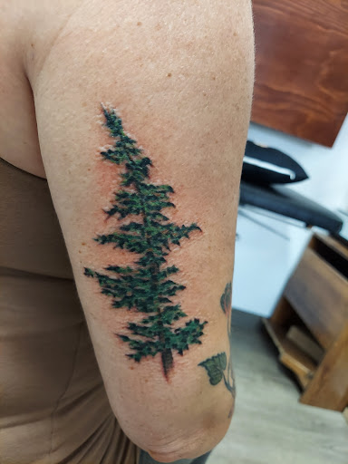 Explore tattoo ideas men arm, creative tattoo ideas in Salem, available at Earth Bound Tattoo and Piercing