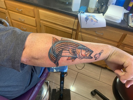 Explore bad omens tattoo ideas, creative tattoo ideas in Hendersonville, available at High Caliber Tattoo