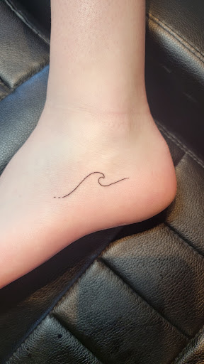 Explore mens back tattoo idea, creative tattoo ideas in Kalispell, available at Swindler Ink