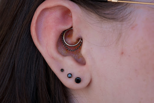 Explore small one piece tattoo ideas, creative tattoo ideas in Mesa, available at Red Art Tattoo & Piercing Studio