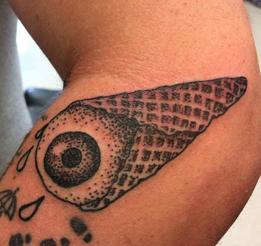 Explore dexter tattoo ideas, creative tattoo ideas in Evans Mills, available at Studio No.8 Body Art Gallery