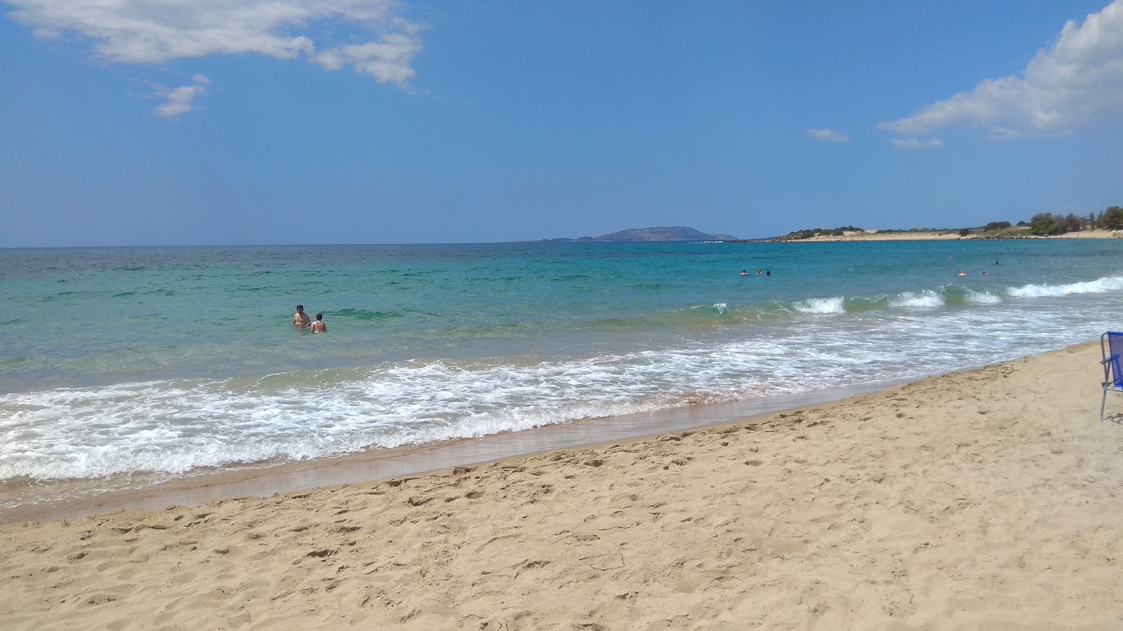 Fotografie cu Romanos beach - locul popular printre cunoscătorii de relaxare