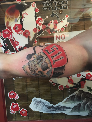 Explore cover up tattoo ideas female wrist, creative tattoo ideas in Kingsford, available at Deft Tattoo Studio