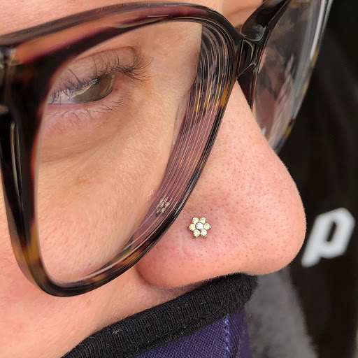 Explore cruise ship tattoo ideas, creative tattoo ideas in Dover, available at Agap Body Piercings