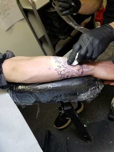 Explore new years tattoo ideas, creative tattoo ideas in Worcester, available at Unholy Grail Tattoo Inc