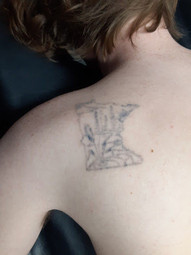 Explore lone wolf tattoo ideas, creative tattoo ideas in Saint Paul, available at Fearless Tattoo Removal