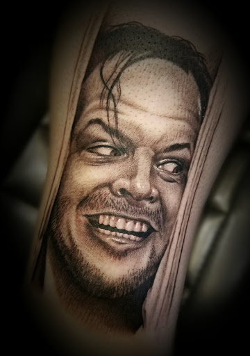 Explore parrot tattoo ideas, creative tattoo ideas in Altus, available at Attitudes Ink