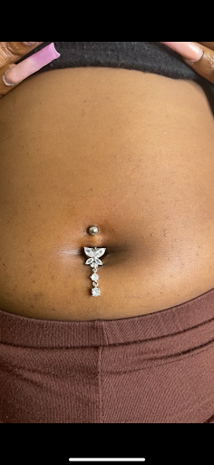 Explore small tattoo ideas for lower back, creative tattoo ideas in Syracuse, available at Flawless Ink LLC