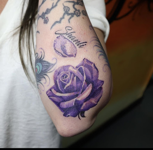 Explore simple dog tattoo ideas, creative tattoo ideas in Buckeye, available at Irie Art in Ink