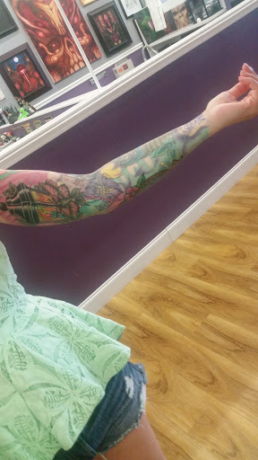 Explore chest piece tattoo ideas for guys, creative tattoo ideas in Cicero, available at Serenity Tattoo