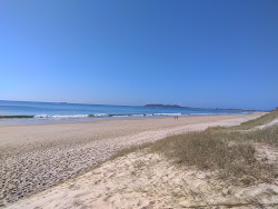 Foto di Tyagarah Beach con costa lunga e dritta