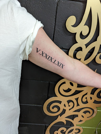 Explore tattoo ideas rose, creative tattoo ideas in Longwood, available at Trinity Tattoo Co Inc