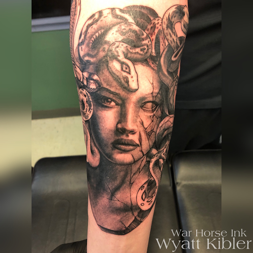 Explore above the knee tattoo ideas, creative tattoo ideas in Kent, available at War Horse Ink