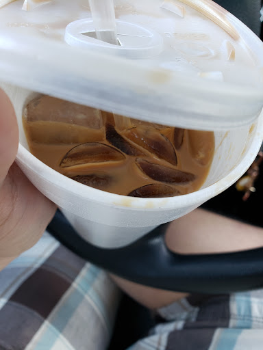Vietnamese Iced Coffee.  The man is a master at the espresso machine.