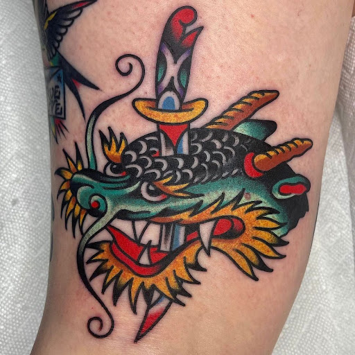 Explore dental tattoo ideas, creative tattoo ideas in Albany, available at Love Dove Tattoo