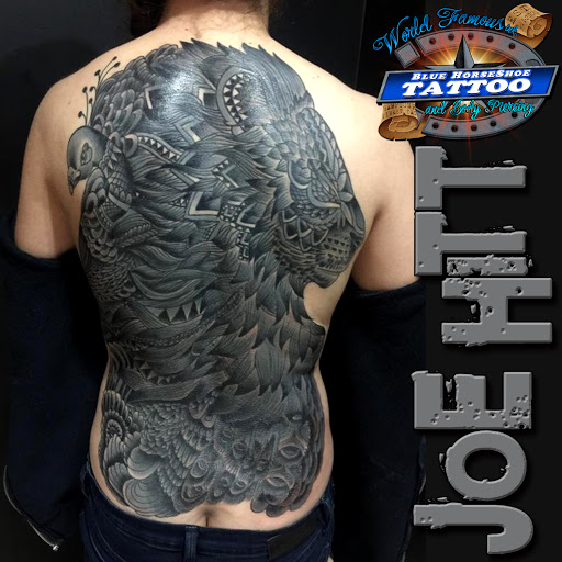 Explore leg tattoo ideas for women, creative tattoo ideas in Virginia Beach, available at World Famous Blue Horseshoe Tattoo and Piercing Independence