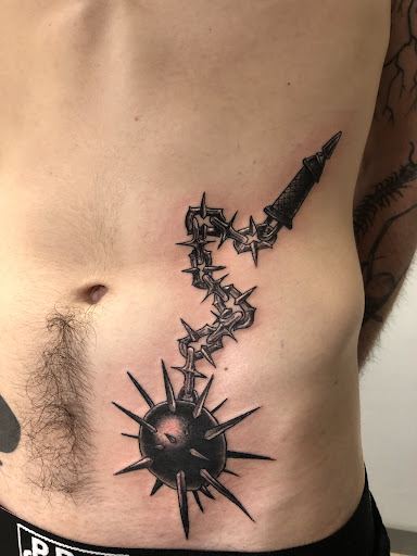 Explore chest and sleeve tattoo ideas, creative tattoo ideas in Englewood, available at Point of Entry Tattoo