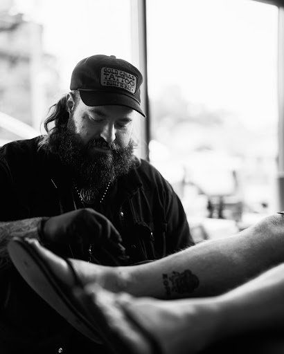 Explore graveyard tattoo ideas, creative tattoo ideas in Johnson City, available at Gold Cross Tattoo Co.