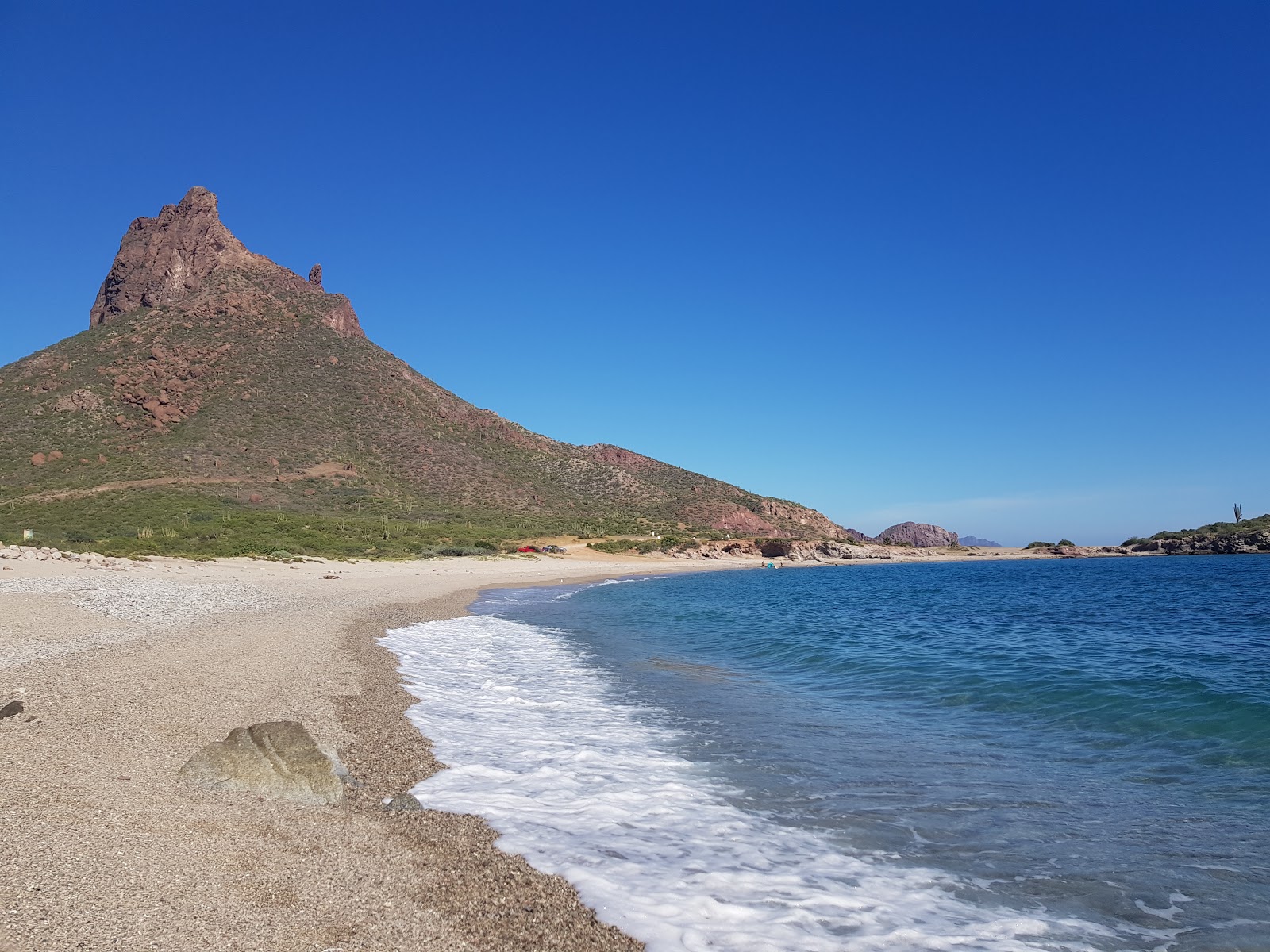 Foto av Piedras beach med lätt fin sten yta
