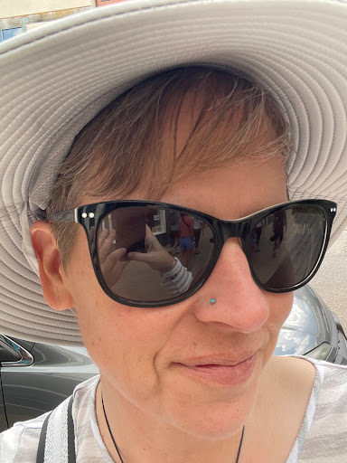 Explore women's spine tattoo ideas, creative tattoo ideas in Boulder, available at IRIS Piercing Studio