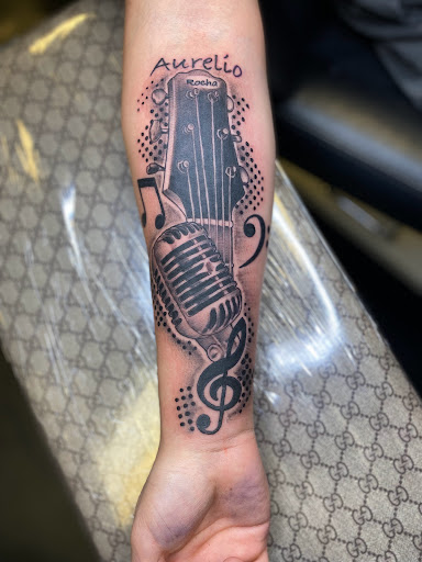 Explore pulp fiction tattoo ideas, creative tattoo ideas in Spartanburg, available at The Gallery Tattoo Shop Spartanburg