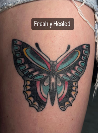 Explore back neck tattoo ideas, creative tattoo ideas in Spring, available at Skin Stories Tat2