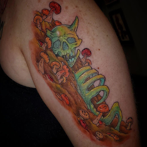 Explore circle tattoo cover up ideas, creative tattoo ideas in Palm Harbor, available at Angry Owl Tattoo and Piercing