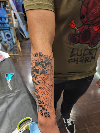 Explore new born tattoo ideas, creative tattoo ideas in Oak Grove, available at NeverMore Galleries Tattoo Studio