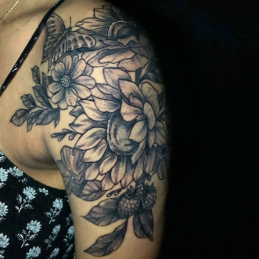Explore spring tattoo ideas, creative tattoo ideas in Buford, available at Inked Arts Tattoo Studio