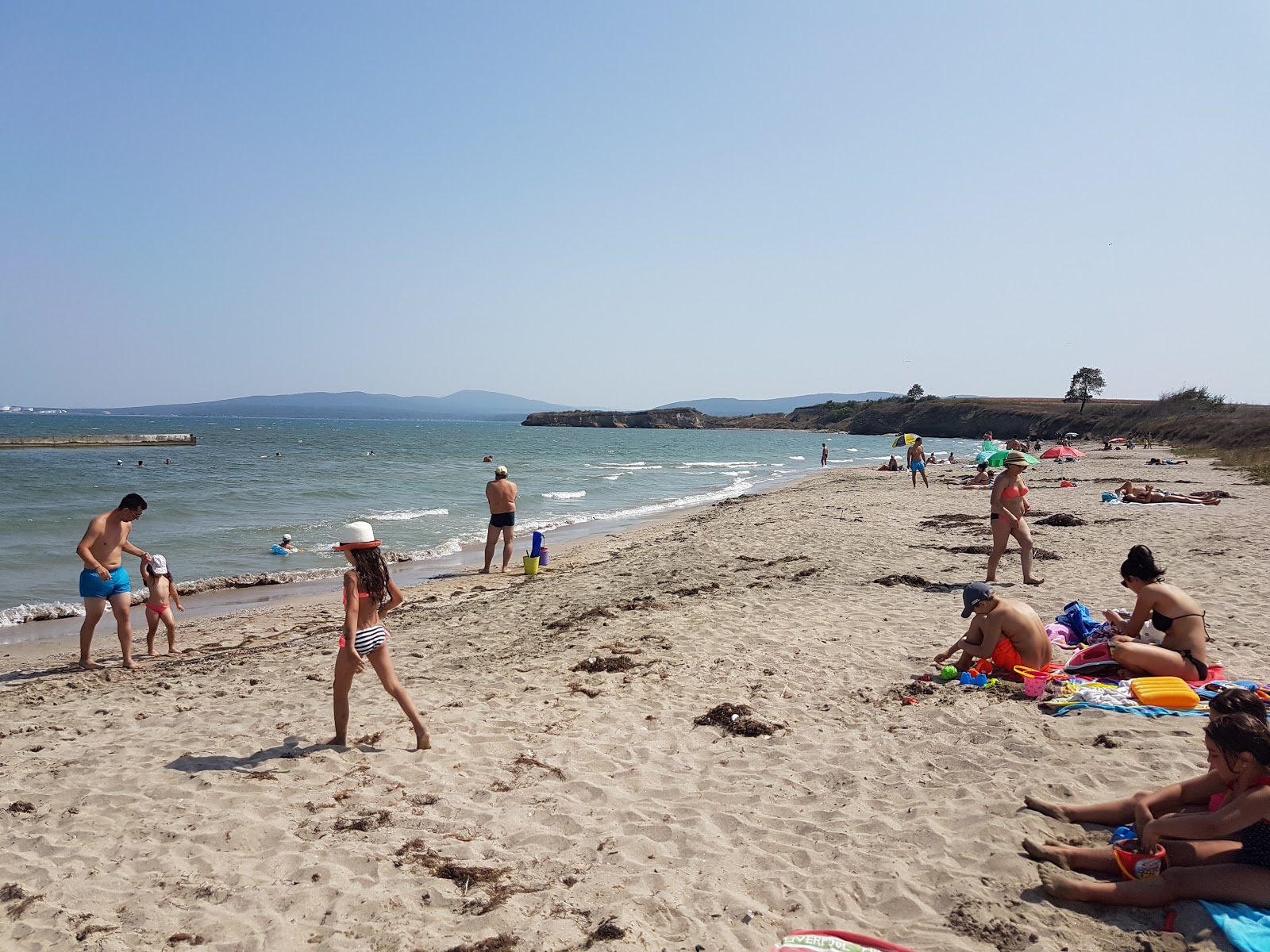 Foto di Nose Foros beach con una superficie del sabbia luminosa