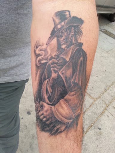 Explore snail tattoo ideas, creative tattoo ideas in Tucson, available at Sacred Art Tattoo Studio