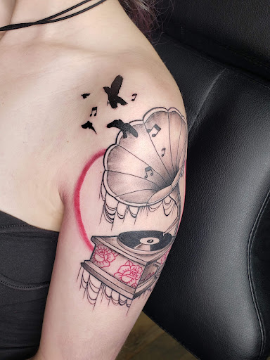 Explore cat tattoo ideas for guys, creative tattoo ideas in Eustis, available at Eclectic Tattoo Collective