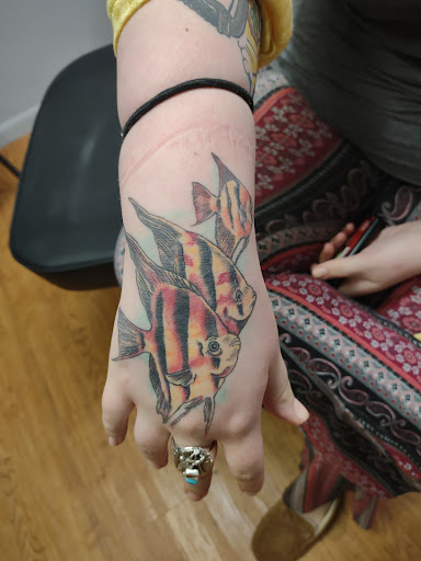 Explore illusion tattoo ideas, creative tattoo ideas in Williamston, available at Inkd Tattoo Parlor