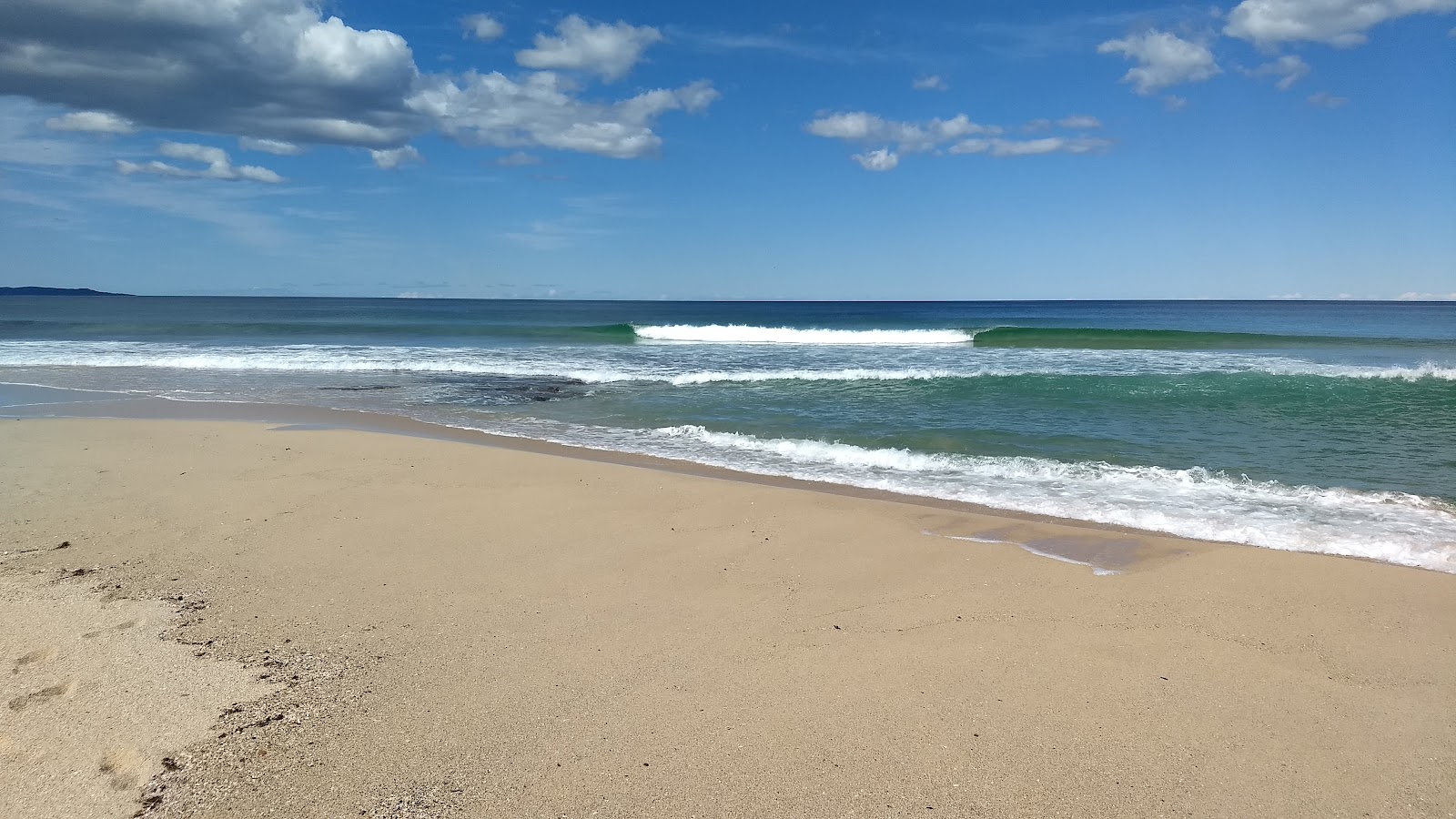 Monument Beach的照片 带有碧绿色纯水表面