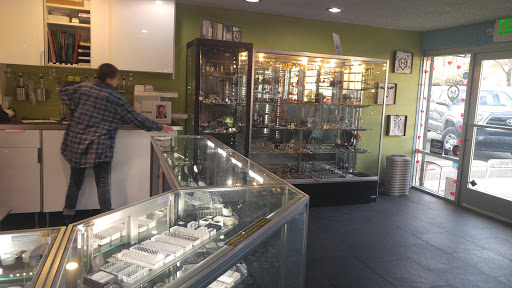 Explore flower of life tattoo ideas, creative tattoo ideas in Phoenix, available at Halo Piercing and Fine Jewelry